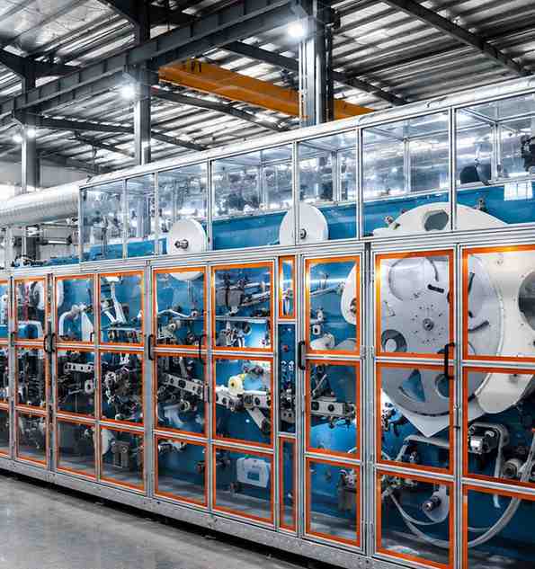 Factory worker manufacturing hygiene products